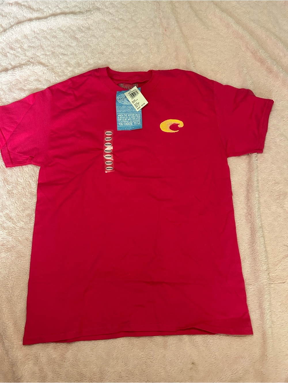 Pink costa t-shirt with yellow graphics